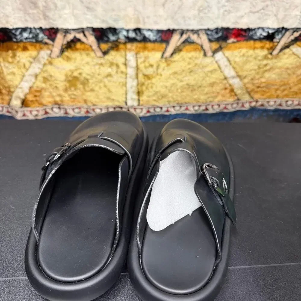 Source Unknown black leather